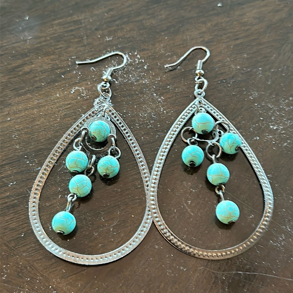 Woman’s dangle earrings
